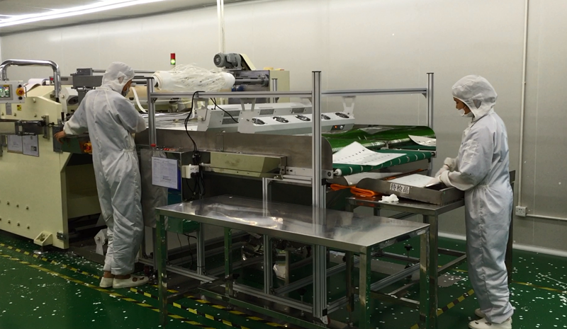 光學膜片抖料機